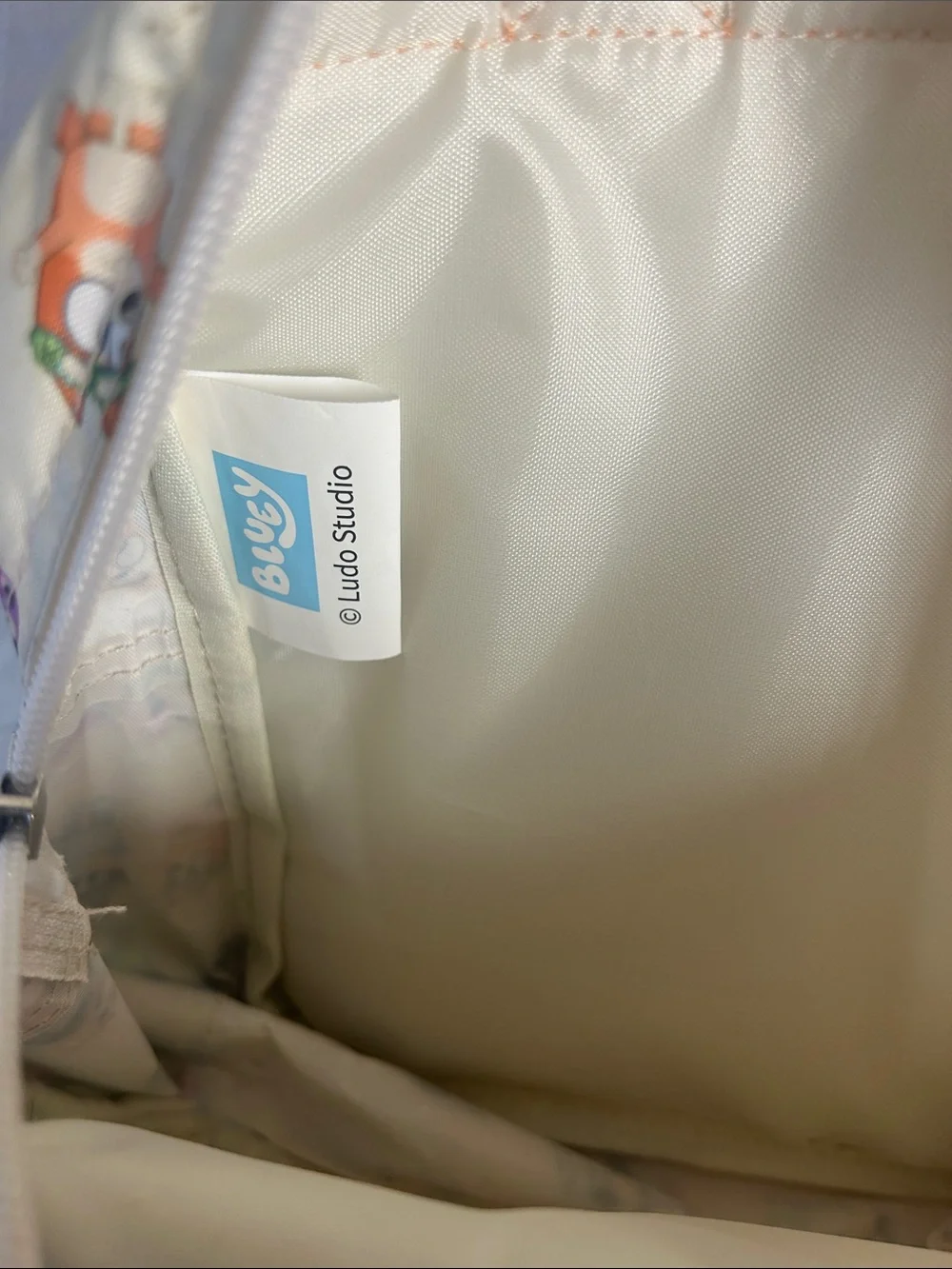 Bluey Kids Cream Backpack with Orange Straps